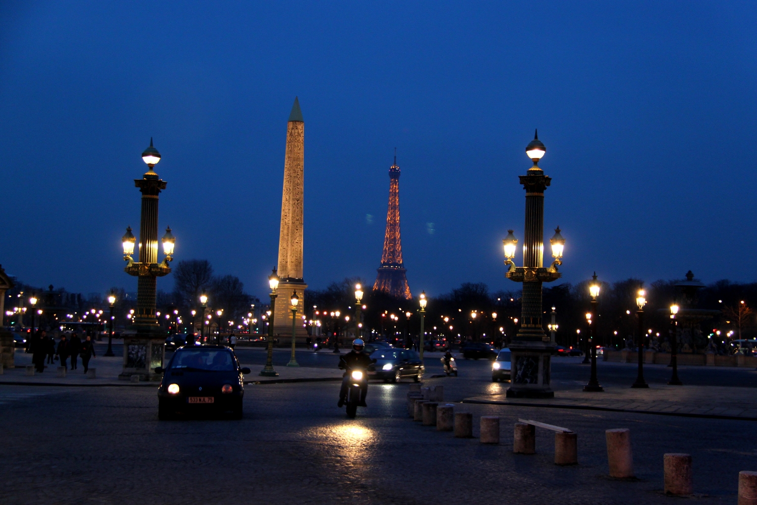 The Luxor Obelisque (Obelisk) in Paris with the Eiffel Tower